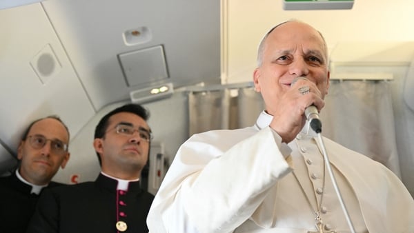 Pope Leo XIV addresses journalists during the flight heading to Algiers