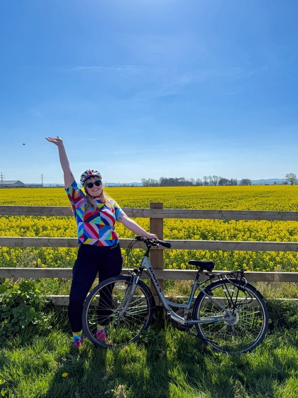 Tara Povey with a bicycle on the Barrow Way