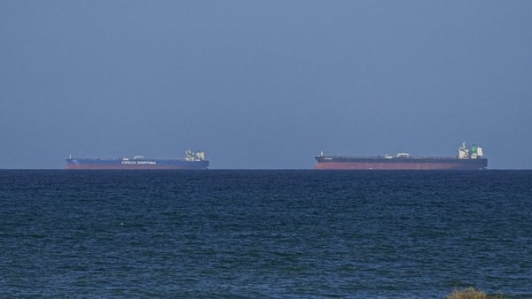 A ship waits to pass through the Strait of Hormuz