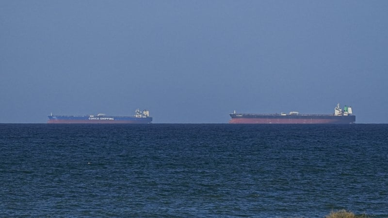 A ship waits to pass through the Strait of Hormuz