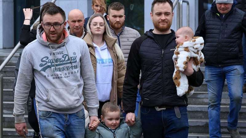 aaron cross on the left and ryan quinn (holding a baby) at drogheda district court
