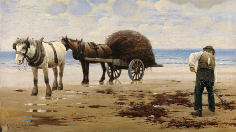 an painting of a man collecting seaweed on a beach with two horses and a cart (Source: WikiCommons)