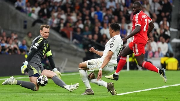 Manuel Neuer of FC Bayern Munich saves a shot from Kylian Mbappe of Real Madrid during the UEFA Champions League 2025/26 Quarter-Final First Leg match between Real Madrid CF and FC Bayern München at Estadio Santiago Bernabeu on April 07, 2026 in Madrid, S