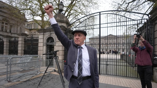 Independent TD Michael Healy-Rae waves to the crowds gathered outside Leinster House, Dublin, after resigning in the Dail as Minister of State. The Dail has returned today from the Easter break, which has been marked by fuel-cost protests and the announce