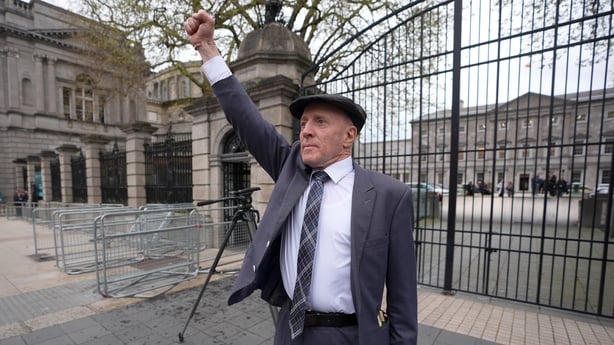 Independent TD Michael Healy-Rae waves to the crowds gathered outside Leinster House, Dublin, after resigning in the Dail as Minister of State. The Dail has returned today from the Easter break, which has been marked by fuel-cost protests and the announcement of a 500 million euro package of support