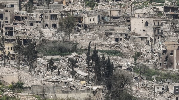 A photograph taken from the Israeli side of the border with Lebanon shows destroyed buildings in southern Lebanon