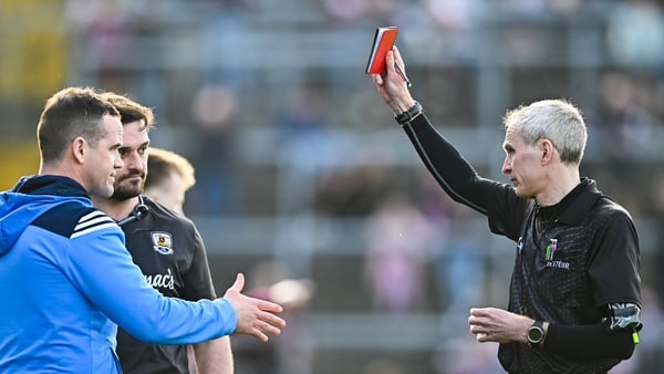 22 March 2026; Referee Fergal Kelly shows the red card to Dublin manager Ger Brennan and to Galway strength and conditioning coach Cian Breathnach McGinn before the start of the second half, during the Allianz Football League Division 1 match between Galw