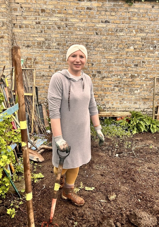 Maria Magdelena stands in her Raheny allotment