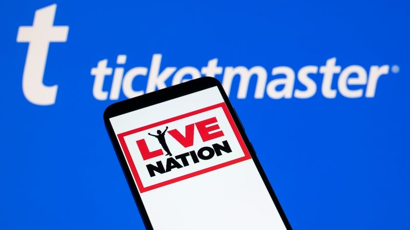 The Live Nation logo is displayed on a mobile phone with Ticketmaster branding seen in the background in this photo illustration in Brussels, Belgium, on October 25, 2025. (Photo by Jonathan Raa/NurPhoto)