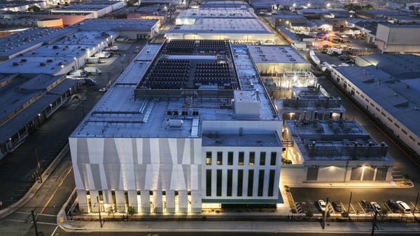An aerial view of a 33 megawatt data center (C) with closed-loop cooling system on April 14, 2026 in Vernon, California. A surge in demand for artificial intelligence (AI) infrastructure is fueling a boom in data centers across the country and around the