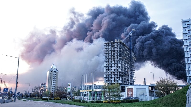 Smoke rises above residential apartment buildings after a Russian combined strike on April 16, 2026 in Kyiv, Ukraine
