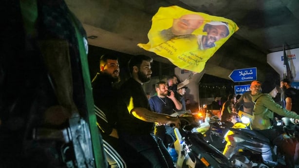 Supporters of Hezbollah celebrate the ceasefire with Israel as it takes effect, in the southern suburbs of Beirut, Lebanon, on April 17, 2026. Gunfire erupted in Beirut's southern suburbs as a ceasefire with Israel came into effect at midnight on April 17 (2100 GMT Thursday), according to AFP journa