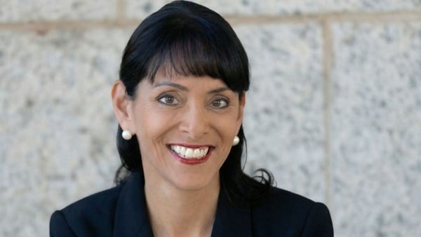 Image of a businesswoman in a dark suit