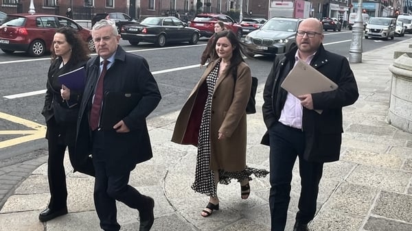 Image of union leaders walking on a street