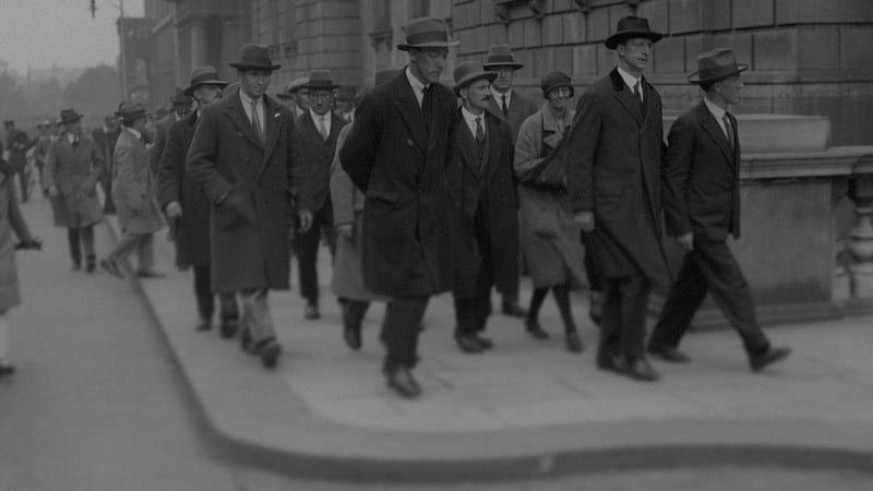 Men walking down by Trinity College 1926