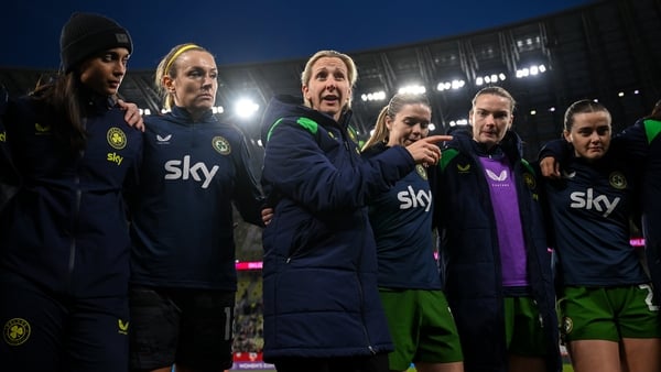 Republic of Ireland head coach Carla Ward with players and staff, from left, performance analyst Jasmine Mander, goalkeeper Grace Moloney, Jamie Finn, Saoirse Noonan and Tyler Toland after the 2027 FIFA Women’s World Cup Qualifier match between Poland and