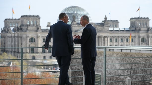 German Chancellor Friedrich Merz () and Micheál Martin