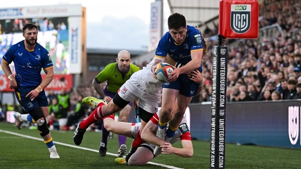 17 April 2026; Jimmy O'Brien of Leinster is tackled into touch by Werner Kok and Jacob Stockdale of Ulster during the United Rugby Championship match between Ulster and Leinster at Affidea Stadium in Belfast. Photo by Ramsey Cardy/Sportsfile