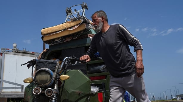 BEIRUT, LEBANON - APRIL 17: A displaced family packs their belongings at a displacement camp, before returning to their home in Southern Lebanon on April 17, 2026 in Beirut, Lebanon. At 00:00 on April 17, a 10-day ceasefire took effect that is meant to pause fighting between Israeli forces and the L