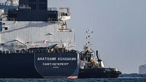 A tugboat guides the Russian oil tanker Anatoly Kolodkin at the oil terminal in the port of Matanzas, northwestern Cuba.