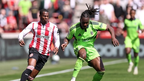 Calvin Bassey of Fulham is challenged by Dango Ouattara of Brentford, Premier League, April 2026