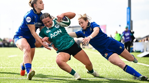 18 April 2026; Robyn O'Connor of Ireland scores her side's fourth try despite the efforts of Sara Mannini, left, and Gaia Buso of Italy during the Women's Six Nations Rugby Championship match between Ireland and Italy at Dexcom Stadium in Galway. Photo by Shauna Clinton/Sportsfile