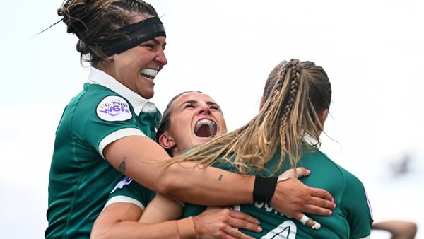18 April 2026; Béibhinn Parsons of Ireland, 14, celebrates with teammates, Erin King, left, and Emily Lane after scoring her second try during the Women's Six Nations Rugby Championship match between Ireland and Italy at Dexcom Stadium in Galway. Photo by