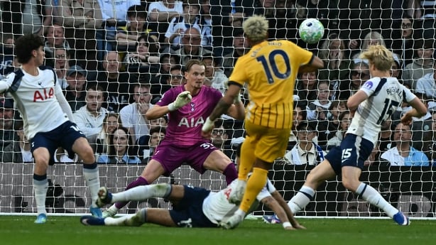 Brighton's French midfielder #10 Georginio Rutter (C) scores their late second goal during the English Premier League football match between Tottenham Hotspur and Brighton and Hove Albion at the Tottenham Hotspur Stadium in London, on April 18, 2026. (Photo by Ben STANSALL / AFP) / RESTRICTED TO EDI