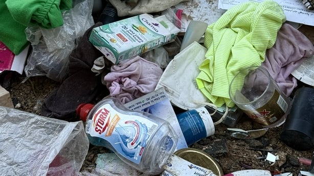 Everyday items like washing-up liquid and wax strips are visible in the rubble in Beirut