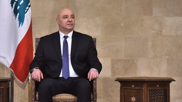 Newly elected Lebanese president Joseph Aoun poses for a photograph at the presidential palace in Baabda, east of Beirut, on January 9, 2025. Lebanon's lawmakers elected army chief Joseph Aoun as the country's 14th president on January 9, after a two-year vacancy of the position, in a step towards l