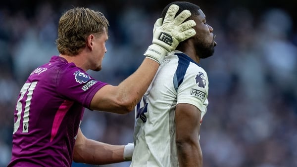 LONDON, ENGLAND - APRIL 18: Antonin Kinsky and Kevin Danso of Tottenham Hotspur react during the Premier League match between Tottenham Hotspur and Brighton & Hove Albion at Tottenham Hotspur Stadium on April 18, 2026 in London, England. (Photo by Sebasti
