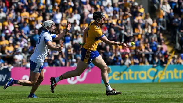 19 April 2026; Niall O'Farrell of Clare is tackled by Dessie Hutchinson of Waterford during the Munster GAA Senior Hurling Championship Round 1 match between Clare and Waterford at Zimmer Biomet Páirc Chíosóg in Ennis, Clare. Photo by Ray McManus/Sportsfi