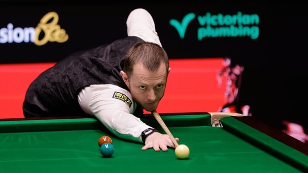 SHEFFIELD, ENGLAND - APRIL 19: Mark Allen of Northern Ireland plays a shot in the first round match against Zhang Anda of China on day 2 of Halo World Championship 2026 at Crucible Theatre on April 19, 2026 in Sheffield, England. (Photo by Tai Chengzhe/VC