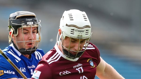 25 March 2023; Eoin Keyes of Westmeath in action against Donnchadh Hartnett of Laois during the Allianz Hurling League Division 1 Relegation Play-Off match between Westmeath and Laois at FBD Semple Stadium in Thurles, Tipperary. Photo by Michael P Ryan/Sp