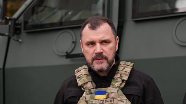 Minister of Internal Affairs of Ukraine Ihor Klymenko attends the scene at a supermarket where a terrorist shooter held hostages and killed people on April 18