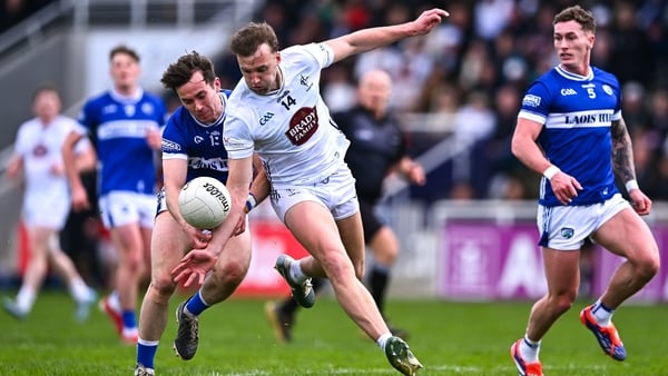 19 April 2026; Darragh Kirwan of Kildare in action against Trevor Collins of Laois during the Leinster GAA Football Senior Championship quarter-final match between Kildare and Laois at Cedral St Conleths Park in Newbridge, Kildare. Photo by Piaras Ó Mídhe