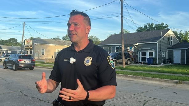 Shreveport Police Department Corporal Chris Bordelon talks to the press across the street from the house where a mass shooting took place in Shreveport, Louisiana, on April 19, 2026. Eight children were killed in a shooting spree early April 19 in the southern US state of Louisiana, in what police s