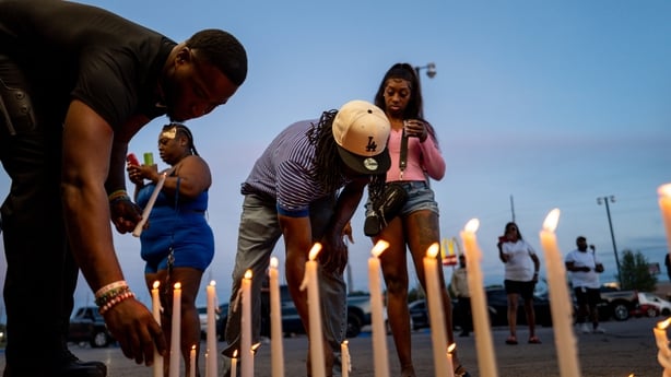 SHREVEPORT, LOUISIANA - APRIL 19: People attend a candlelight vigil on April 19, 2026 in Shreveport, Louisiana. Eight children were killed and two women were wounded during a domestic violence incident in the early morning hours, according to local authorities. (Photo by Brandon Bell/Getty Images)
