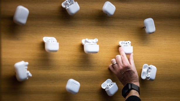 A display of AirPods 4 earphones in the Apple Inc. store on Regent Street in London, UK, on Friday, Sept. 20, 2024. Apple is facing an unprecedented challenge: persuading customers to buy its latest iPhones without their biggest new feature. Photographer: Chris Ratcliffe/Bloomberg
