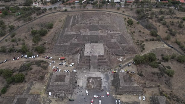 An aerial view of the Pyramid of the Moon following a shooting 