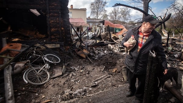 A resident stands in front of a house destroyed by a drone strike in Shostka, Sumy region, Ukraine,on April 19, 2026. The incident resulted in the destruction of several homes. (Photo by Francisco Richart Barbeira/NurPhoto via Getty Images)