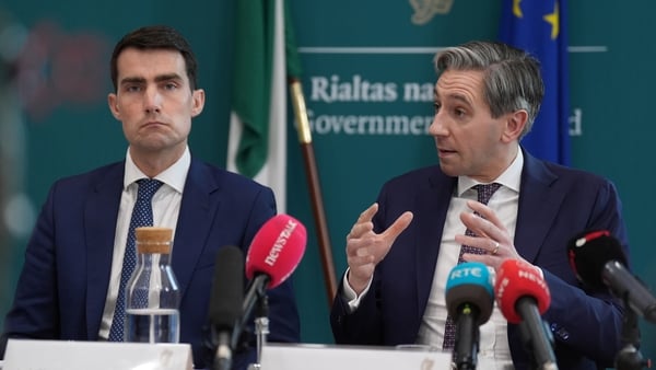 L-R Public Expenditure Minister Jack Chambers and Finance Minister Simon Harris speaking to the media at the department of Finance in Dublin about the Spring Economic Statement. PA