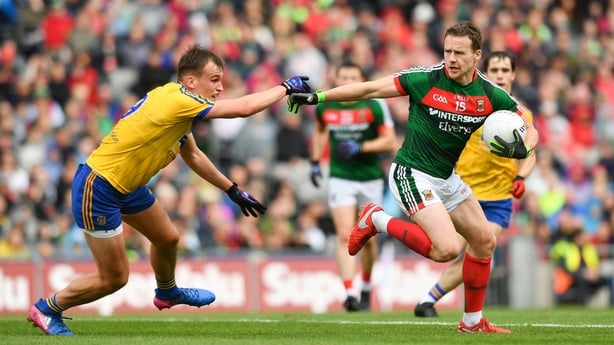 30 July 2017; Andy Moran of Mayo is tackled by Enda Smith of Roscommon during the GAA Football All-Ireland Senior Championship Quarter-Final match between Mayo and Roscommon at Croke Park in Dublin. Photo by Ramsey Cardy/Sportsfile