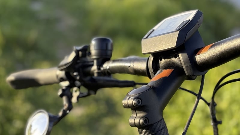 A view of the handles of an electric bike