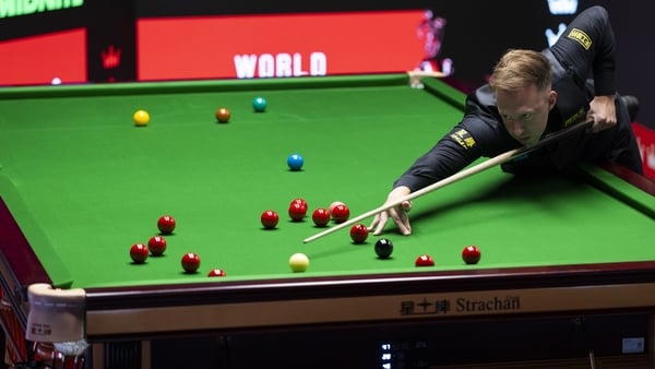 SHEFFIELD, ENGLAND - APRIL 21: Judd Trump of England plays a shot against Gary Wilson of England during day four of the Halo World Snooker Championship at The Crucible Theatre on April 21, 2026 in Sheffield, England. (Photo by Sam Bloxham/Getty Images)