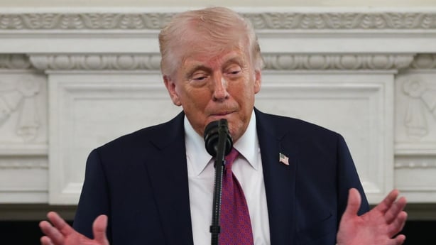 WASHINGTON, DC - APRIL 21: U.S. President Donald Trump makes remarks as he hosts NCAA champion athletes during a NCAA Collegiate National Champions Day event in the State Dining Room at the White House on April 21, 2026 in Washington, DC. The White House hosted more than 100 champion collegiate stud