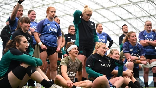 22 April 2026; Players, including Emily Lane, centre, huddle to watch a highlight reel of last week's match in Galway, during an Ireland Women's Rugby squad training session at the IRFU High Performance Centre in Dublin. Photo by Shauna Clinton/Sportsfile