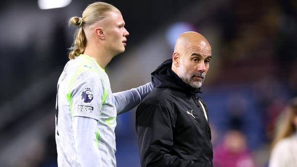 BURNLEY, ENGLAND - APRIL 22: Pep Guardiola, Manager of Manchester City, interacts with Erling Haaland after the Premier League match between Burnley and Manchester City at Turf Moor on April 22, 2026 in Burnley, England. (Photo by Alex Livesey/Getty Image