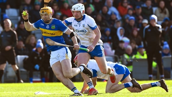 15 March 2026; Jake Morris of Tipperary is tackled by Shane Bennett of Waterford during the Allianz Hurling League Division 1A match between Waterford and Tipperary at Azzuri Walsh Park in Waterford. Photo by Ray McManus/Sportsfile