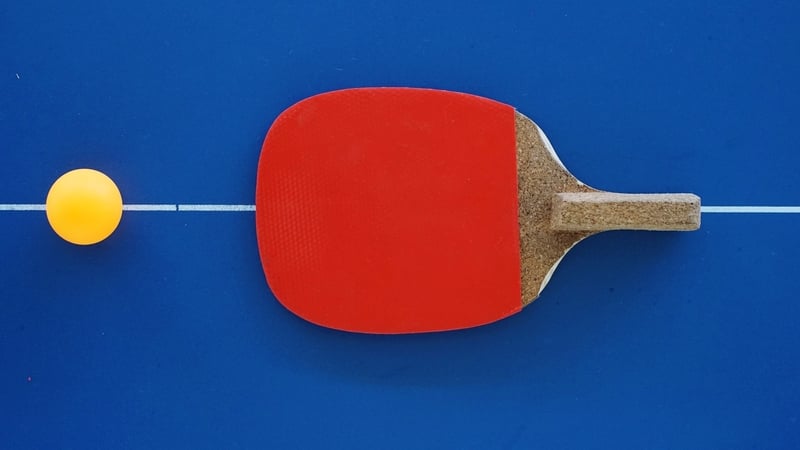 table tennis bat and ball